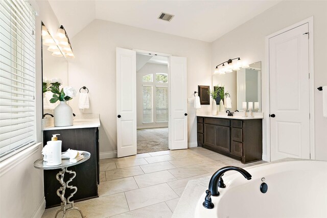 19002 Dublin Bay Blvd, Tomball, TX 77377 - bathroom featuring vanity and a garden tub