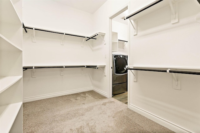 19002 Dublin Bay Blvd, Tomball, TX 77377 - spacious closet featuring light carpet and washer / clothes dryer