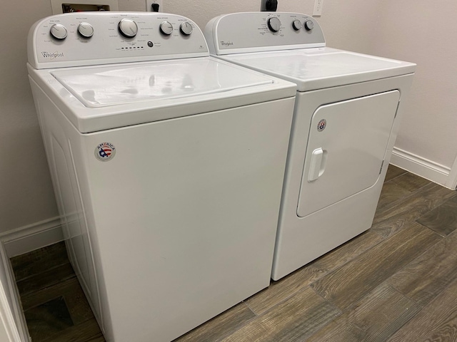 19002 Dublin Bay Blvd, Tomball, TX 77377 - laundry room featuring washing machine and clothes dryer and dark wood-type flooring