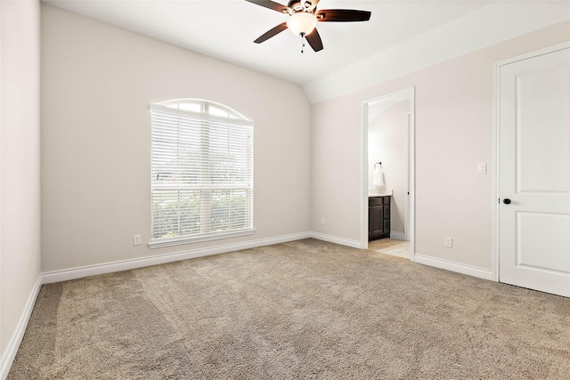 19002 Dublin Bay Blvd, Tomball, TX 77377 - unfurnished bedroom with light colored carpet, ensuite bathroom, lofted ceiling, and a ceiling fan