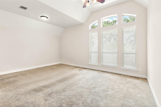 19002 Dublin Bay Blvd, Tomball, TX 77377 - carpeted empty room with vaulted ceiling and a ceiling fan