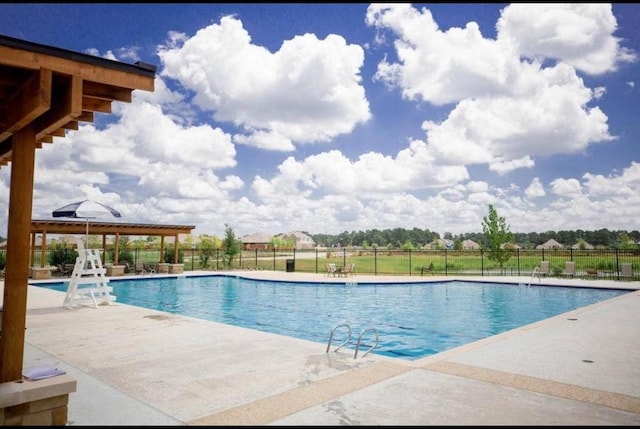 19002 Dublin Bay Blvd, Tomball, TX 77377 - community pool featuring a patio