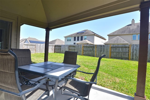 12421 Berberry Dr, Texas City, TX 77568 - fenced backyard featuring outdoor dining space and a patio