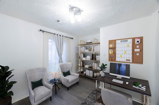 8526 Greenleaf Lake Dr, Houston, TX 77095 - office area featuring wood finished floors and a textured ceiling