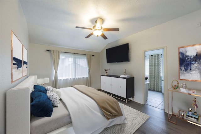 8526 Greenleaf Lake Dr, Houston, TX 77095 - bedroom with lofted ceiling, dark wood-type flooring, and a ceiling fan