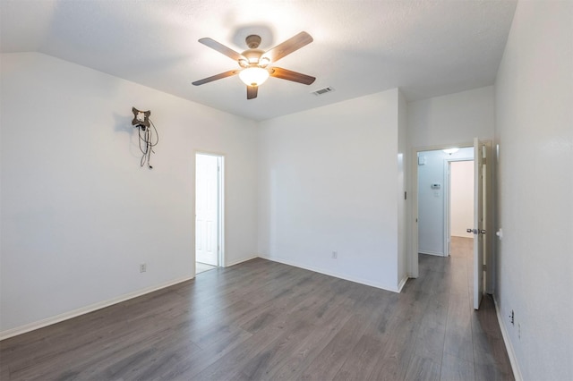 8526 Greenleaf Lake Dr, Houston, TX 77095 - empty room featuring ceiling fan, dark wood-style floors, and lofted ceiling