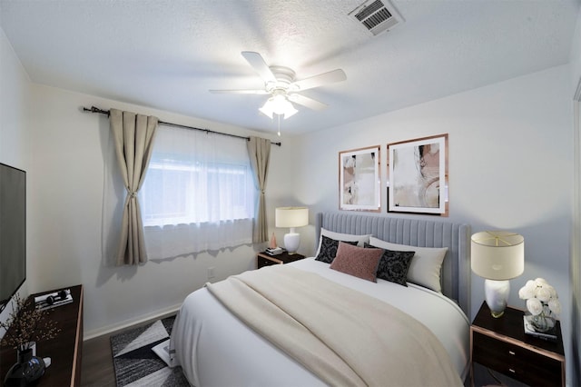 8526 Greenleaf Lake Dr, Houston, TX 77095 - bedroom with ceiling fan and wood finished floors