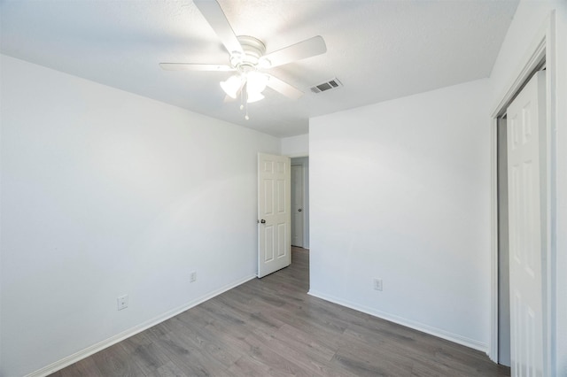 8526 Greenleaf Lake Dr, Houston, TX 77095 - unfurnished bedroom with wood finished floors and ceiling fan