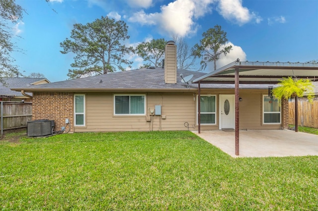 8526 Greenleaf Lake Dr, Houston, TX 77095 - back of house featuring a patio and a chimney