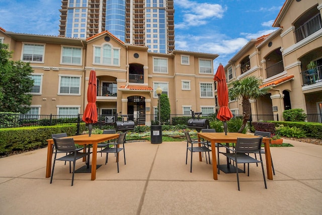 3231 Allen Pkwy Unit 5303, Houston, TX 77019 - view of patio featuring outdoor dining space and a grill