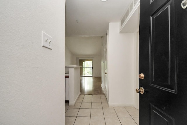3231 Allen Pkwy Unit 5303, Houston, TX 77019 - foyer entrance featuring light tile patterned flooring and a textured wall