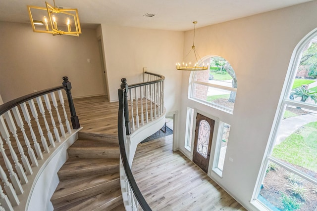 17406 Moreton Ln, Spring, TX 77379 - foyer featuring a chandelier and wood finished floors