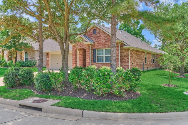 59 Pleasant Point Pl, Spring, TX 77389 - view of front of property with brick siding, an attached garage, and a front yard