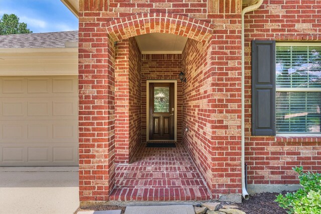 59 Pleasant Point Pl, Spring, TX 77389 - entrance to property with brick siding and an attached garage