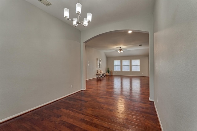 59 Pleasant Point Pl, Spring, TX 77389 - spare room featuring arched walkways, hardwood / wood-style flooring, ceiling fan, and a chandelier