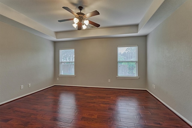 59 Pleasant Point Pl, Spring, TX 77389 - unfurnished room with a tray ceiling, wood finished floors, a ceiling fan, and a textured wall