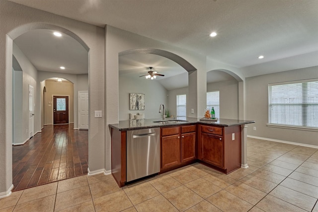 59 Pleasant Point Pl, Spring, TX 77389 - kitchen with stainless steel dishwasher, dark stone counters, recessed lighting, light tile patterned floors, and a ceiling fan