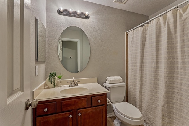 59 Pleasant Point Pl, Spring, TX 77389 - bathroom with vanity, a textured wall, and a shower with curtain
