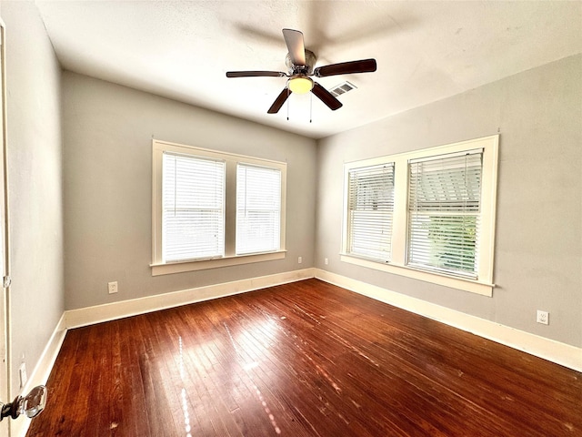 2616 Beauchamp St, Houston, TX 77009 - empty room featuring healthy amount of natural light, wood-type flooring, and a ceiling fan