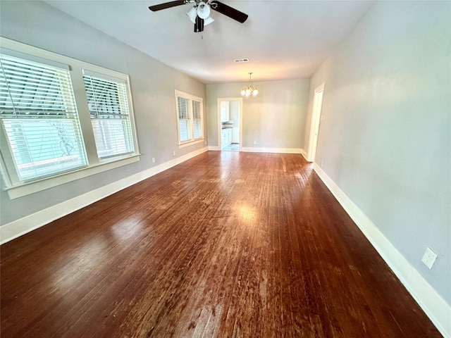 2616 Beauchamp St, Houston, TX 77009 - spare room featuring a chandelier, wood finished floors, and ceiling fan