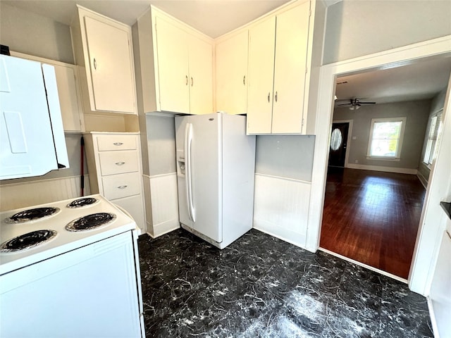 2616 Beauchamp St, Houston, TX 77009 - kitchen featuring white appliances, ceiling fan, white cabinets, and light countertops