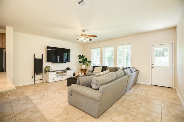 511 Moore St, Richwood, TX 77531 - living room with light tile patterned floors and ceiling fan