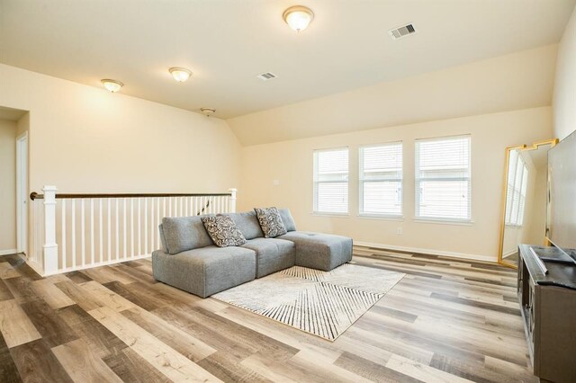 511 Moore St, Richwood, TX 77531 - living room featuring wood finished floors and lofted ceiling