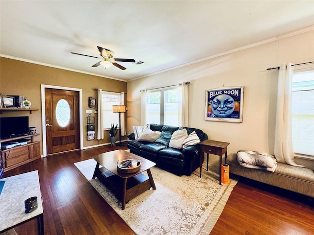 2614 Beauchamp St, Houston, TX 77009 - living room featuring wood finished floors, ceiling fan, and ornamental molding