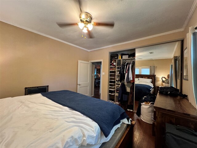2614 Beauchamp St, Houston, TX 77009 - bedroom featuring wood finished floors, crown molding, ceiling fan, and a closet