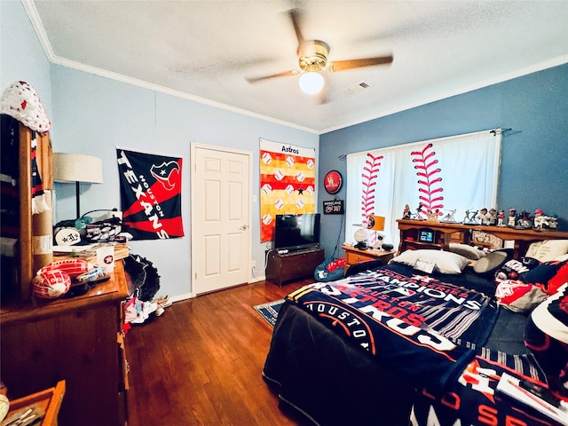 2614 Beauchamp St, Houston, TX 77009 - bedroom featuring wood finished floors, crown molding, and a ceiling fan