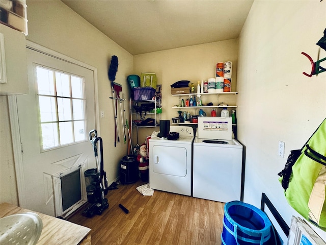 2614 Beauchamp St, Houston, TX 77009 - laundry area with washing machine and clothes dryer and wood finished floors