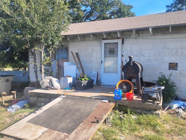 7510 US Highway 67 Unit 84, Bangs, TX 76823 - entrance to property featuring concrete block siding and washer / clothes dryer