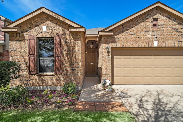 22526 Belmont Cove Ln, Katy, TX 77449 - view of front of property featuring brick siding, a garage, and concrete driveway