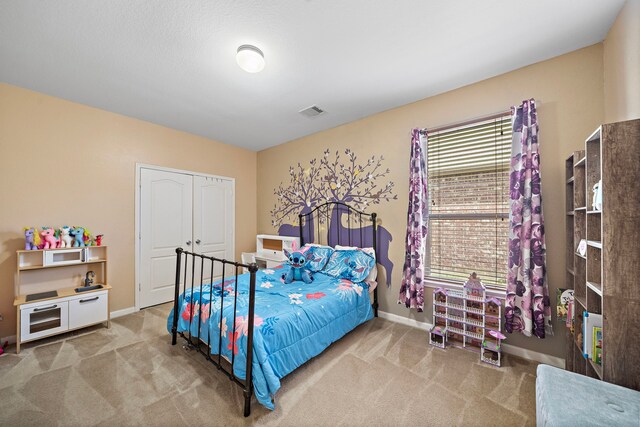 22526 Belmont Cove Ln, Katy, TX 77449 - carpeted bedroom with baseboards and a closet