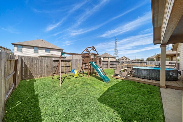 22526 Belmont Cove Ln, Katy, TX 77449 - fenced backyard featuring a playground