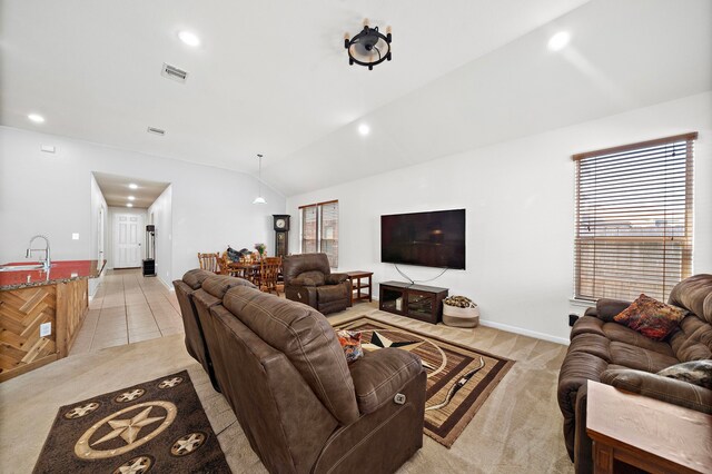 22526 Belmont Cove Ln, Katy, TX 77449 - living room with light carpet, lofted ceiling, recessed lighting, and light tile patterned flooring