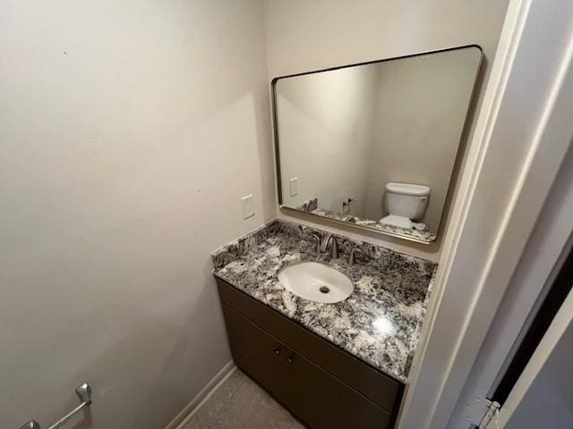 7655 S Braeswood Blvd Unit 8, Houston, TX 77071 - bathroom with vanity and toilet