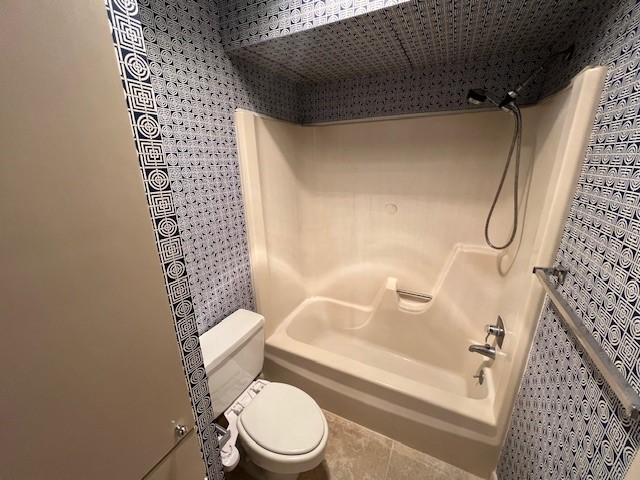 7655 S Braeswood Blvd Unit 8, Houston, TX 77071 - full bathroom featuring tile patterned flooring and  shower combination
