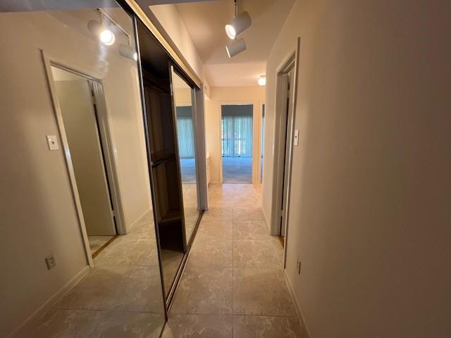 7655 S Braeswood Blvd Unit 8, Houston, TX 77071 - hall with baseboards