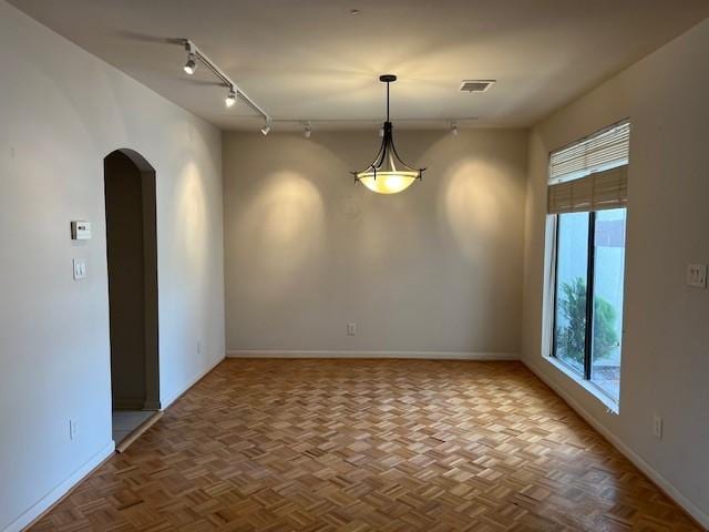 7655 S Braeswood Blvd Unit 8, Houston, TX 77071 - spare room with arched walkways and rail lighting