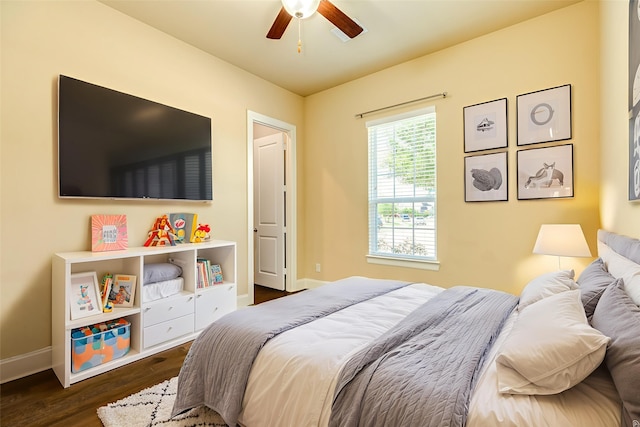 10306 Terra St, Iowa Colony, TX 77583 - bedroom featuring dark wood-style floors and ceiling fan