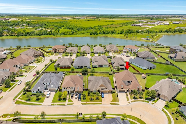 10306 Terra St, Iowa Colony, TX 77583 - aerial view of residential area featuring a large body of water