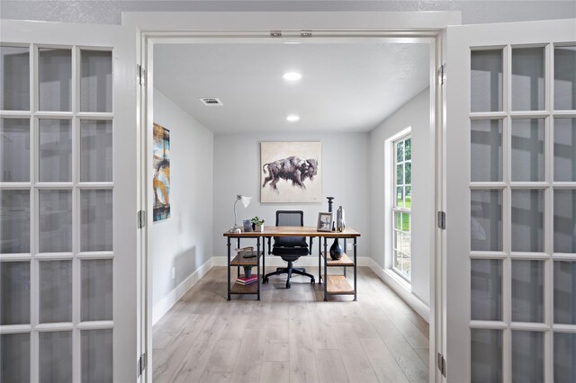 459 Live Oak Rd, Wharton, TX 77488 - office space featuring light wood-style flooring, recessed lighting, and french doors