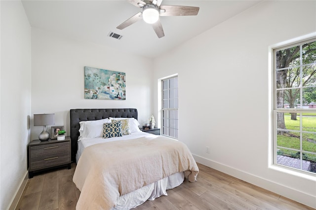 459 Live Oak Rd, Wharton, TX 77488 - bedroom featuring wood finished floors and a ceiling fan