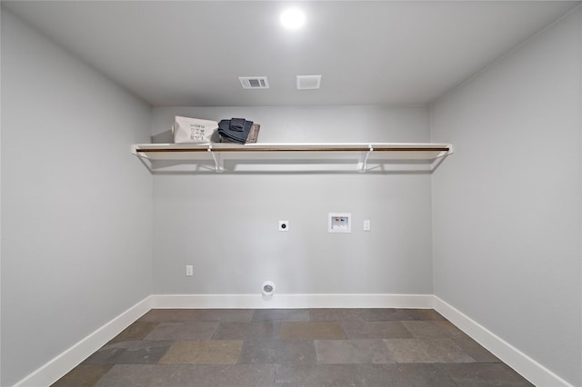 459 Live Oak Rd, Wharton, TX 77488 - washroom with hookup for a washing machine, hookup for an electric dryer, and stone finish flooring