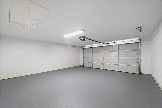 459 Live Oak Rd, Wharton, TX 77488 - garage featuring a garage door opener and baseboards