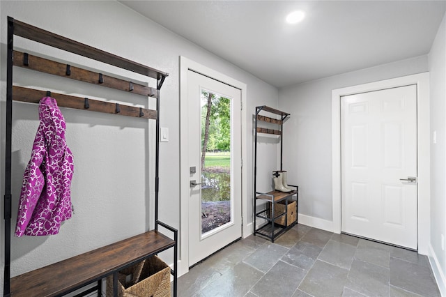 459 Live Oak Rd, Wharton, TX 77488 - mudroom featuring baseboards and stone tile floors