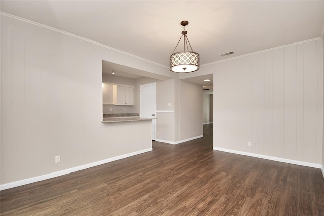 6307 Briar Rose Dr Unit 120, Houston, TX 77057 - unfurnished living room featuring dark wood finished floors and ornamental molding