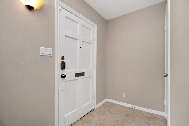6307 Briar Rose Dr Unit 120, Houston, TX 77057 - entryway with light tile patterned floors and baseboards