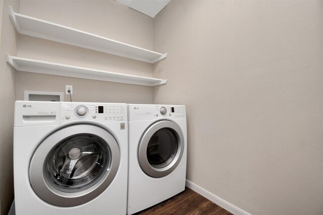 6307 Briar Rose Dr Unit 120, Houston, TX 77057 - washroom with independent washer and dryer and dark wood-style flooring